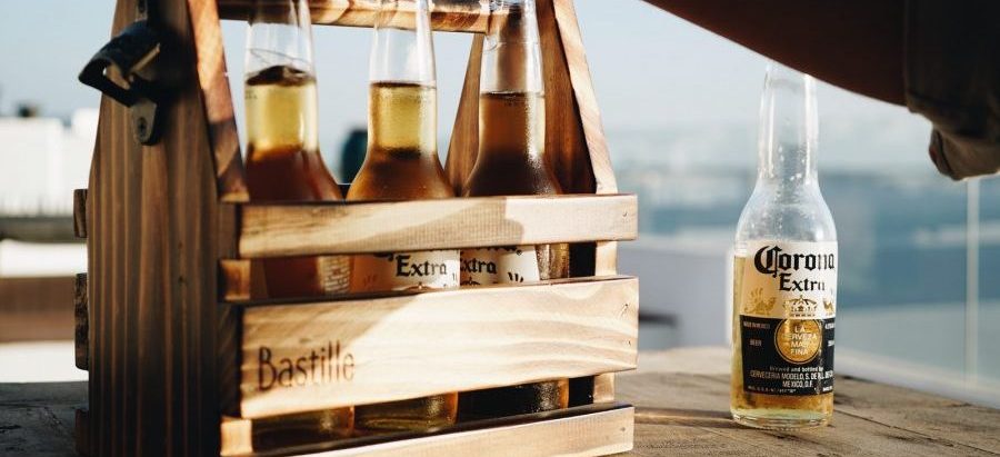 corona extra beer bottles on brown wooden crate